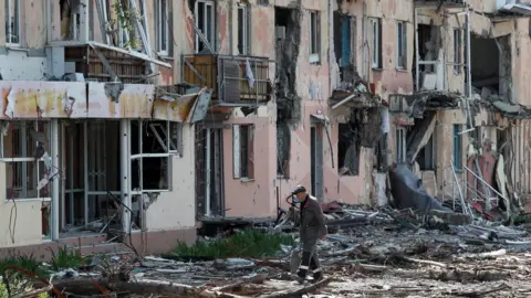 Reuters A view shows a damaged building in Mariupol