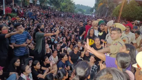 Scores of students seen in protests outside the university