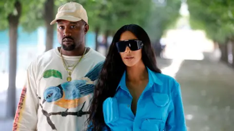 Getty Images Kanye West and Kim Kardashian