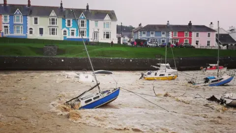 Rachel Beston Boats in Aberaeron harbour were dislodged during the storm