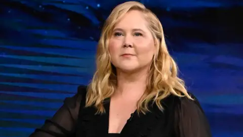 Comedian & actress Amy Schumer arrives on The Tonight Show Starring Jimmy Fallon on Tuesday, February 13, 2024