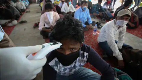 Getty Images A man in a quarantine centre in India