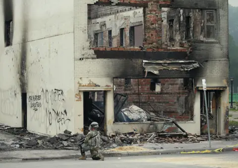 Getty Images Burned-out building in Minneapolis