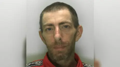 Gloucestershire Constabulary A police mugshot of Simon Clifford Jones