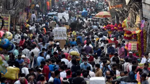 Getty Images A large crowd seen at Sadar Bazar on the eve of Navratri festival amid Coronavirus on October 16, 2020 in New Delhi, India.