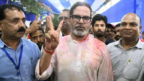  Jan Suraaj Party president and Bankipur winning candidate Prashant Kishore flashing victory sign after win in Bankipur By-Election at A.N. College on August 3, 2026 in Patna, India. 