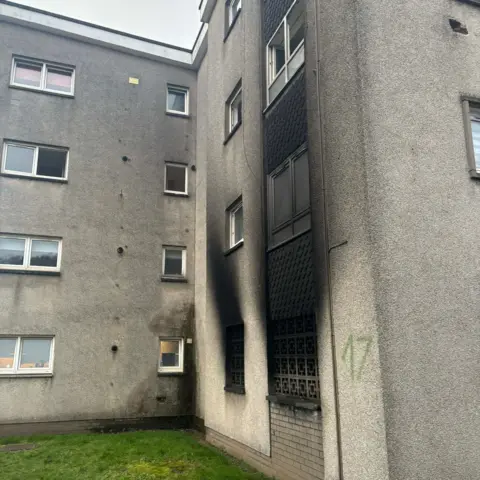 Alysha McLean The side of the flat block in Dumbarton after the fire.