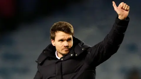 Rangers manager Danny Rohl celebrates at the final whistle after the 1-0 win against Hibernian in the Scottish Premiership at Ibrox