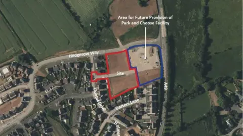 Bloor Homes An aerial map that shows a housing estate next to green belt. A small area of undeveloped land is highlighted with a red perimeter to demonstrate an area where housing plans have been revealed, with a space to the right highlighted in blue where a park and ride site is planned. 