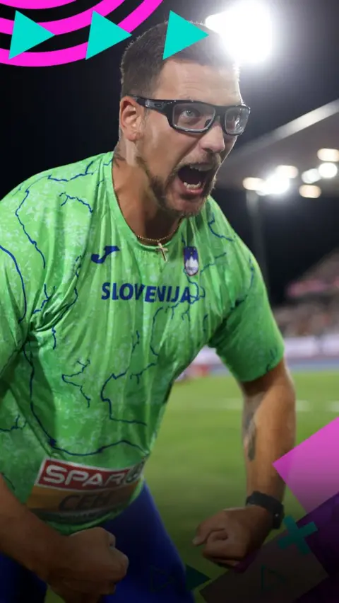 Kristjan Ceh flexes in celebration of winning men's discus