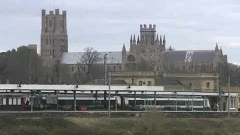 BBC Ely railway station, with the cathedral in the background