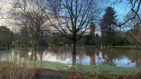 Charnwood Borough Council Grassed area at Queen's Park covered in water