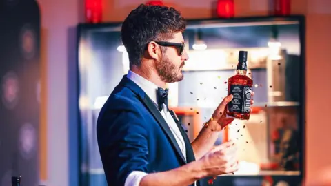 Brendan Rodrigues Photography Mathew Knight performing a magic trick