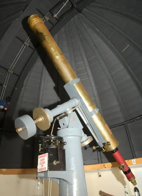Heritage Lottery Fund A brass telescope inside a small domed observatory