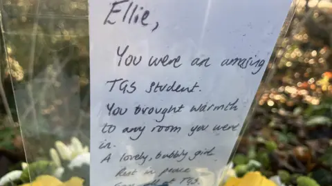 Nicola Rees/BBC Tribute which says: "Ellie, you were an amazing TGS student. You brought warmth to any room you were in. A lovely, bubbly girl. Rest in peace."