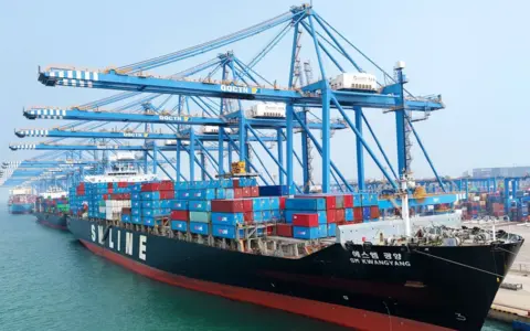 Getty Images Dozens of freighters dock for loading and unloading at the Qingdao section of the Shandong Pilot Free Trade Zone in Qingdao, Shandong province, China, Sept 27, 2023.