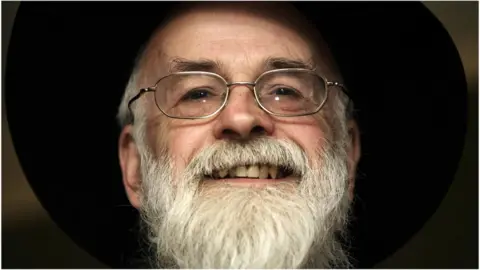 PA Media Sir Terry Pratchett in 2009