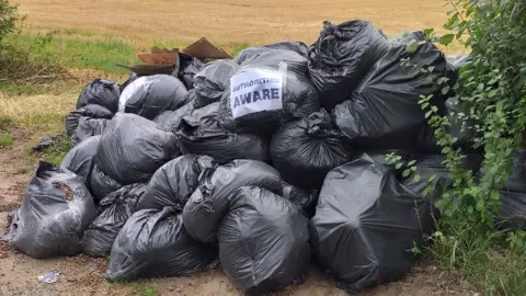 BBC Bin bags full of cannabis plant remnants