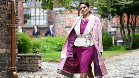 PA Media Priti Patel