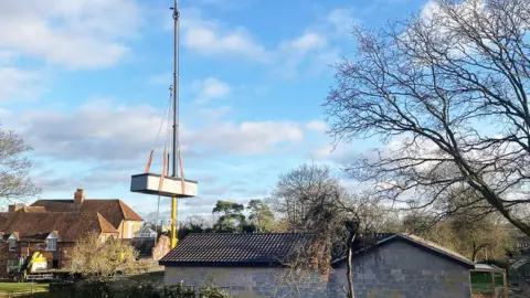 South Beds News Agency Spa pool lifted out by crane