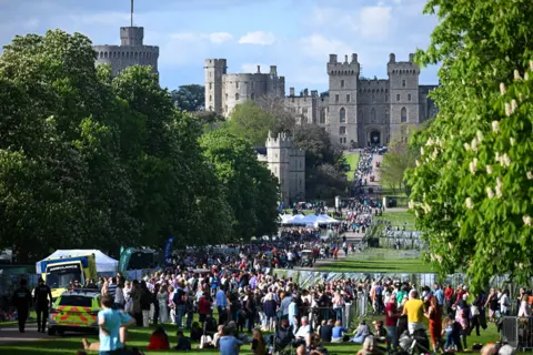 Getty Images Crowds are seen as people queue and enter the grounds of Windsor Castle, during the Coronation Concert on May 07, 2023 in Windsor, England