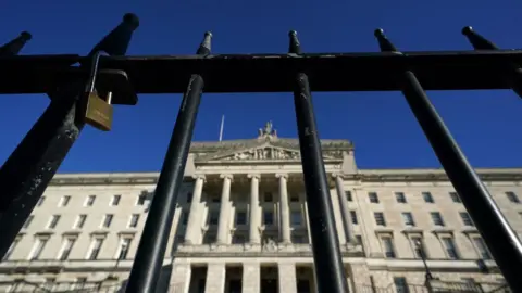 PA Media Stormont with padlocked gate