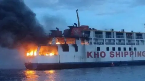 Fire burning on passenger ship at sea in the Philippines