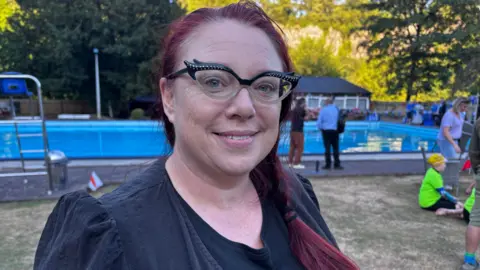 Amy Garratt at New Bath Lido, looking at the camera