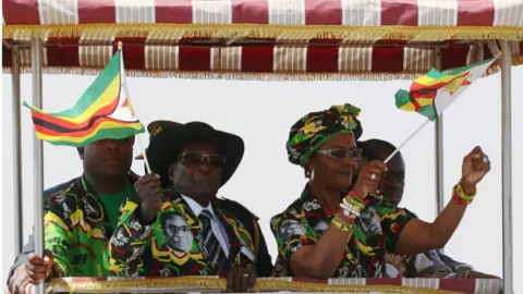 Reuters President Robert Mugabe and his wife Grace arrive for a rally in Gweru, Zimbabwe -1 September 2017