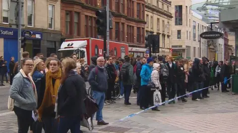 Crowds watch firefighters