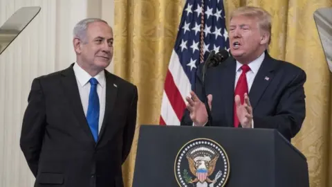 Getty Images Benjamin Netanyahu and Donald Trump make joint statement in the White House - 28 January