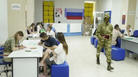 Getty Images Russian passport office in Kherson