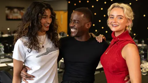 James Pardon/BBC/Bad Wolf Sethu Varada with Ncuti Gatwa and Millie Gibson at a table read