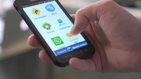 Soti Man using Soti software