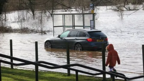 Car in floodwater in Bridge of Allan