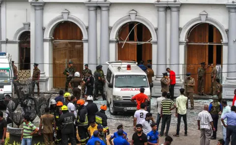 Getty Images Sri Lankan security forces secure the area around St. Anthony's Shrine after an explosion hit St Anthony's Church in Kochchikade