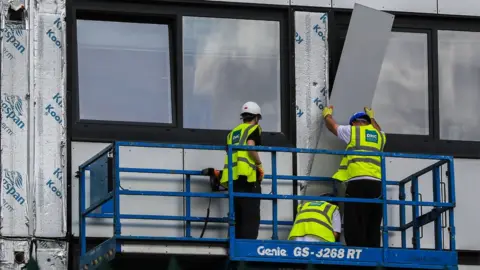 PA Media Cladding being removed from a building