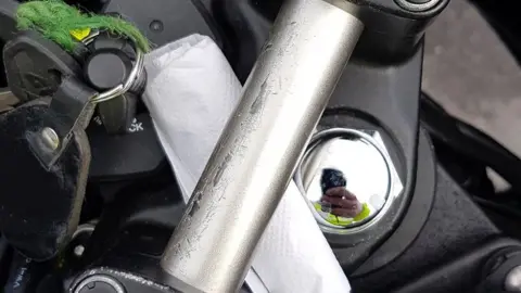 Jamie Frayne The note was tucked onto the motorbike