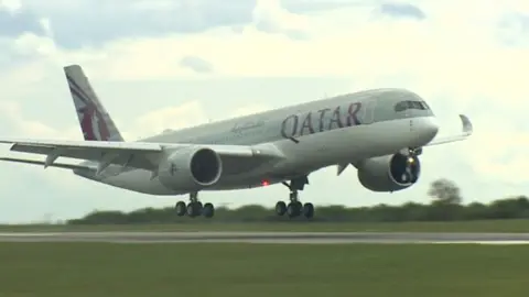 BBC The first passenger flight from Doha lands at Cardiff