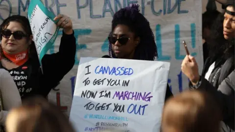 Getty Images Protesters rally against Virginia Governor Ralph Northam outside of the governor's mansion in downtown Richmond, Virginia