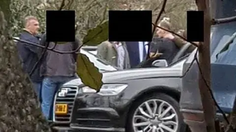 AFP Alleged Russian agents at a car park near the OPCW in The Hague in April