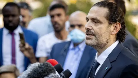 EPA Saad Hariri speaks to reporters outside the Special Tribunal for Lebanon, in the Netherlands (18 August 2020)