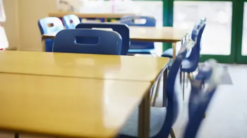 Getty Images Empty desk