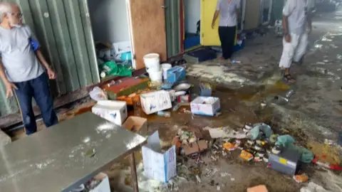 ABDUL AZIZ ADAM A photo of what a refugee says is the result of PNG police tearing down and throwing away refugee's belongings