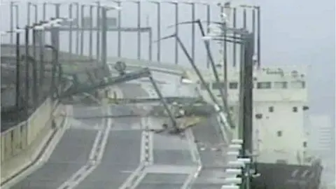 AFP A tanker ship hit a bridge connecting the city of Izumisano with Kansai airport,