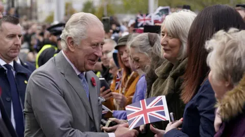 Britain's King Charles III greets members of the public while arriving for a reception with young leaders from across Bradford, at Bradford City Hall