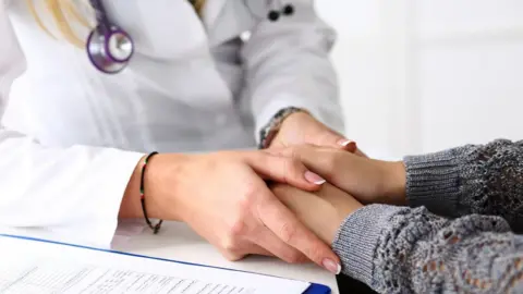 Getty Images Doctor and patient
