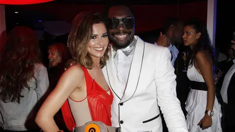 Getty Images Cheryl and Will I Am