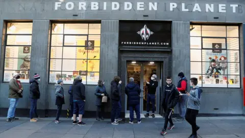 Reuters People queue outside Forbidden Planet