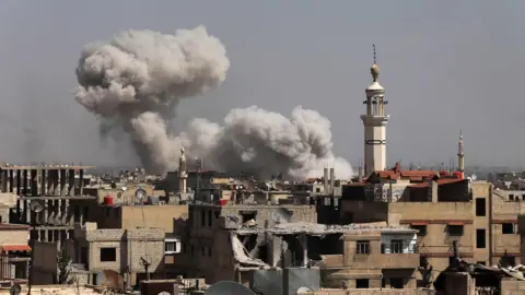 AFP/Getty Bombardment of the town of Kafr Batna in the south of Eastern Ghouta